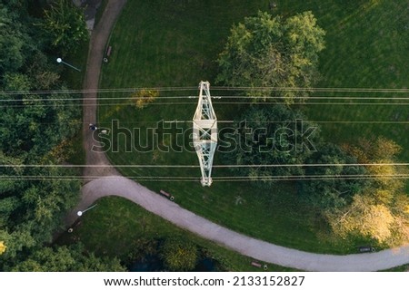 
high voltage electric pole seen from above, shot from a drone Royalty-Free Stock Photo #2133152827