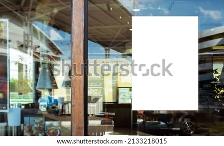 White paper poster mockup displayed outside the building restaurant. Marketing and business concept.  Royalty-Free Stock Photo #2133218015