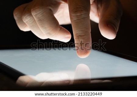 Finger touch on Tablet screen Mock up with light. Concept for mobile phone technology and technology.