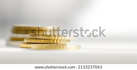 coins representing saving, on white