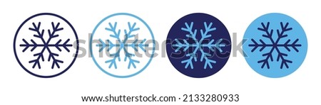 Snowflake icon on round design. Blue snowflake symbol isolated on white background.