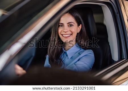 Picture of adult woman, getting her driver's licence.
