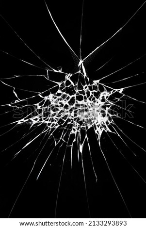 Cracked glass on a black background