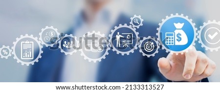 Annual budget and financial planning concept with manager or executive CFO crafting or validating company's income and expenses forecast. Corporate finance and strategic plan. Royalty-Free Stock Photo #2133313527