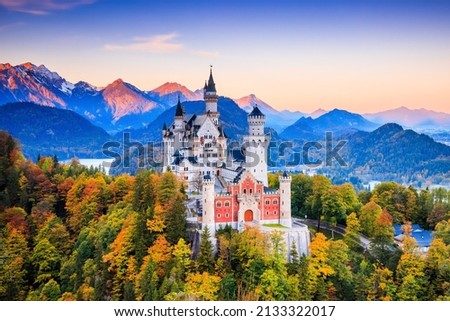 Neuschwanstein Castle (Schloss Neuschwanstein) Bavaria. Fussen, Germany. Front view of the castle at sunrise. The Bavarian Alps in the background. Royalty-Free Stock Photo #2133322017