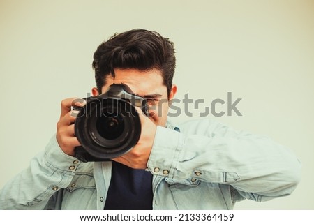 young photographer with different reactions