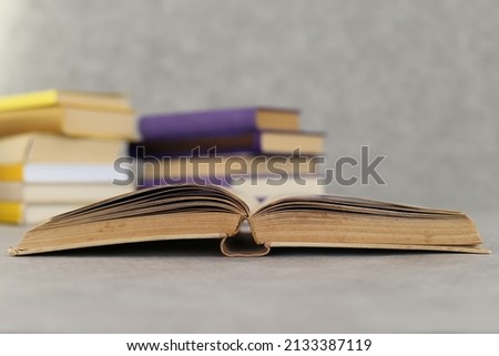 Open book on the gray background