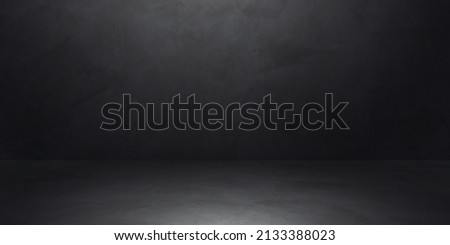 Dark, Black cement wall room studio background and Rough floor with soft light well editing montage display products and text present on empty free space Backdrop Backgrounds 