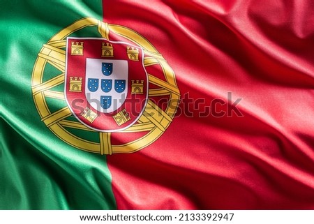 Waving flag of Portugal. National symbol of country and state.