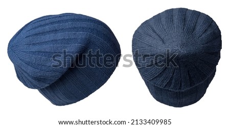 two knitted dark blue hat isolated on a white background. stylish hat top side view. fashion accessory for casual style