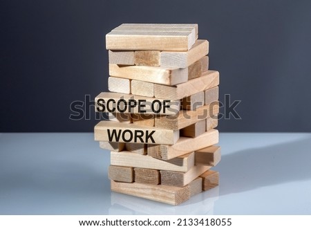 The text on wooden blocks SCOPE OF WORK