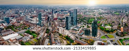 Aerial drone view of Manchester city in UK on a beautiful sunny day.