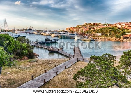 View of the harbor with luxury yachts of Porto Cervo, Sardinia, Italy. The town is a worldwide famous resort and a luxury yacht magnet and billionaires' playground Royalty-Free Stock Photo #2133421453