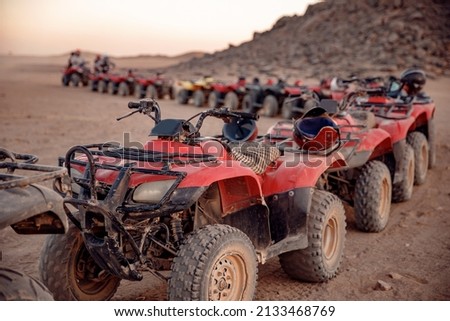 Safari Quad bikes ATV in desert Sharm Hurghada Cairo, Egypt. Concept extreme travel sport.