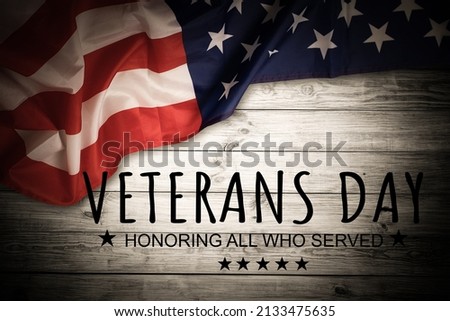 Happy Veterans Day. American flags with the text. November 11