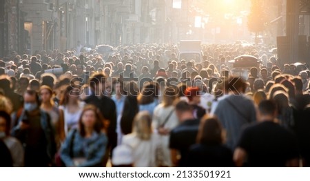 Blurred crowd of unrecognizable at the street Royalty-Free Stock Photo #2133501921