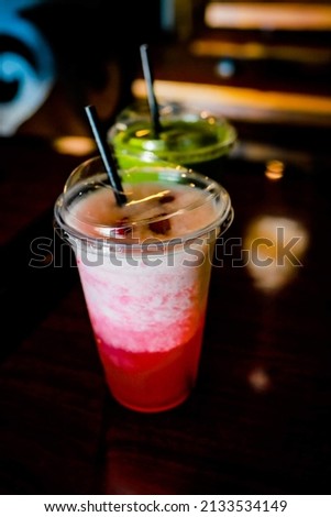 Delicious photo of a strawberry raspberry spritzer shake