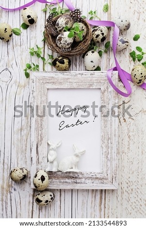 easter greeting card with quail eggs and spring flowers. mock up frame with copy space