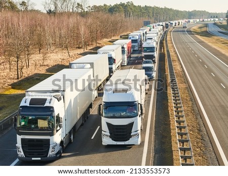 Lorry truck stack in long traffic jam on lane
