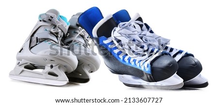 Two pairs of ice skates isolated on white background.