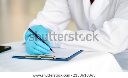Woman doctor working in medical office. Medical and healthcare concept