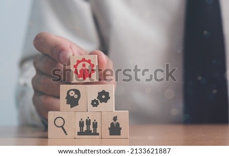 Trends in business 2022 which skills aspiring proffessionals including communication , analytical, Ethics and Awarness, Management and leadership. Reskill businessman concept Royalty-Free Stock Photo #2133621887