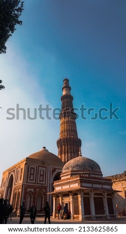 Photos of the Qutab Minar located in Delhi. Taken from different angles