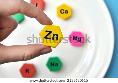 Icons of minerals and macronutrients. Choosing zinc from other useful substances Royalty-Free Stock Photo #2133650515
