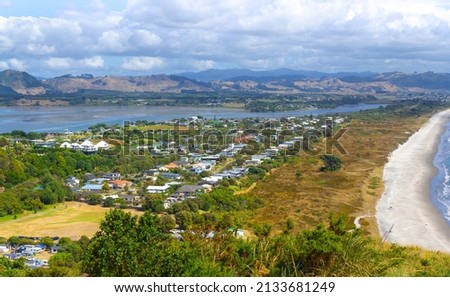 View to Bowentown Beach and Waihi Beach at Bay of Plenty in the North Island of New Zealand Royalty-Free Stock Photo #2133681249