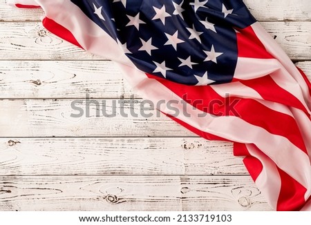 USA Memorial day, Presidents day, Veterans day, Labor day, or 4th of July celebration. USA national flag on white wooden background
