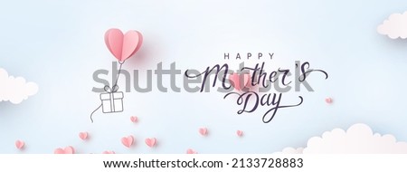 Mother's day postcard with paper flying elements and gift box on blue sky background. Vector symbols of love in shape of heart for greeting card design Royalty-Free Stock Photo #2133728883