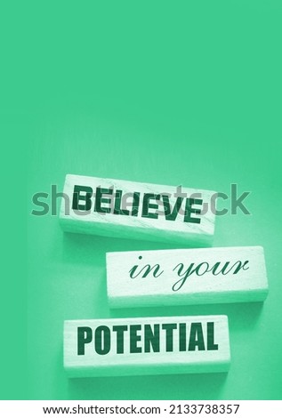 Believe in Your Potential word written on wooden blocks. Motivation for achievements in business or career concept.