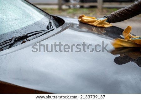 Hand Car Wash Service on a Black SUV in United Kingdom