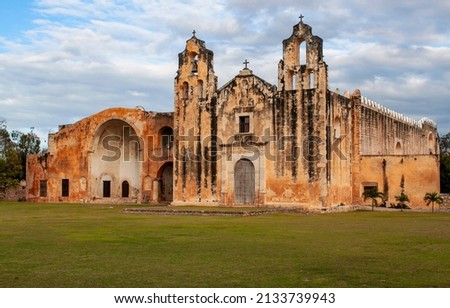 Exterior view of the historical Church and Convent of San Miguel Arcangel in Maní, in the central region of the Yucatan Peninsula, in the Mexican state of Yucatán, Mexico. It was built in 1549. Royalty-Free Stock Photo #2133739943