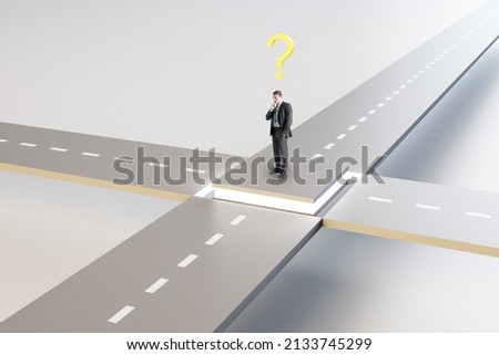 Attractive young european man standing at crossroads with question. Solution, way and direction concept