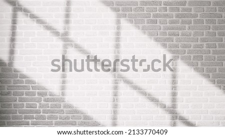 shadow on white brick wall background