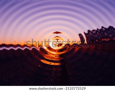 Sunset water over landscape in metaverse conceptual reality imagination virtual and real world - cybersapce hypothesized iteration of the internet, supporting persistent online 3-D virtual Royalty-Free Stock Photo #2133772529
