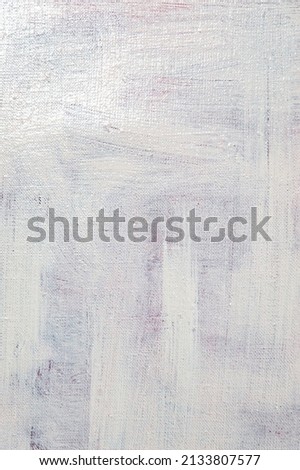 abstract light creative background - rough linen canvas unevenly covered with white primer. Toning, blur. Temporary object. 