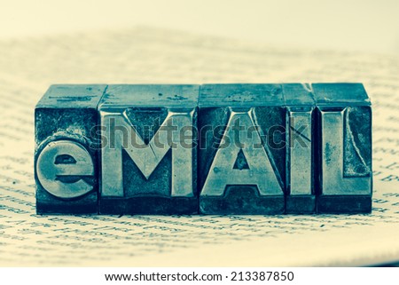 the word "e-mail" in lead letters written. symbol photo for quick correspondence