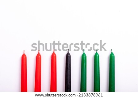 Composition of halloween candles and copy space on white background. horror, fright, halloween tradition and celebration concept digitally generated image.
