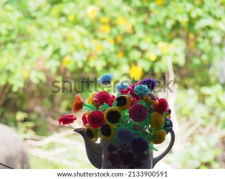 Handmade plastic flowers are very rare.