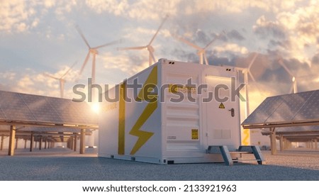 modern battery energy storage system with wind turbines and solar panel power plants in background at sunset Royalty-Free Stock Photo #2133921963