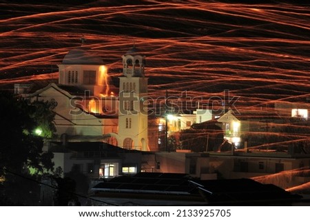 rocketwar is a tradition that happens every easter between the 2 orthodox churches at vrontados Chios island Greece. Royalty-Free Stock Photo #2133925705