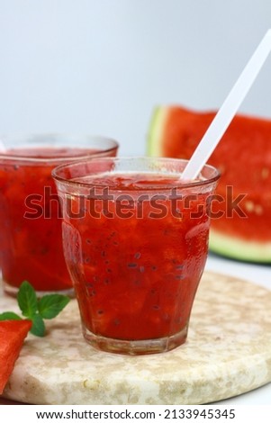 Es Semangka or Watermelon ice drink on isolated white background. Selective focus, copy space for text. 