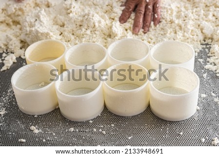 8 empty moulds for fresh cheese production