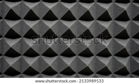 Background of sound absorbing sponge, wall soundproofing in selective focus
