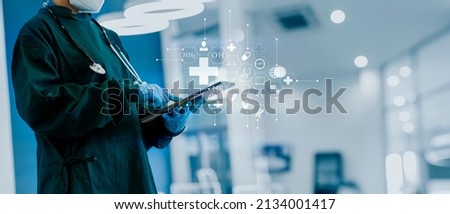 Medicine doctor using tablet with digital medical interface icons and hospital blur background, Medical technology and network concept, 