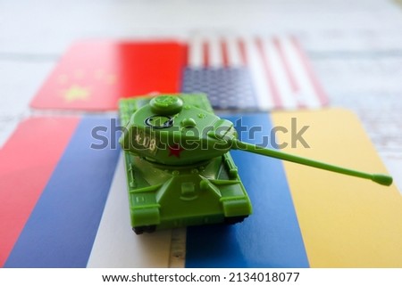 toy tank and russian, ukrainian, chinese and usa flags crisis risk sanctions war conflict russia ukraine wallpaper