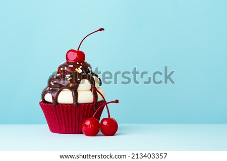 Ice cream sundae cupcake  Royalty-Free Stock Photo #213403357