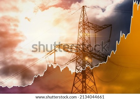 Transmission tower and raising sparkline chart representing electricity prices rise during global energy crisis. Royalty-Free Stock Photo #2134044661